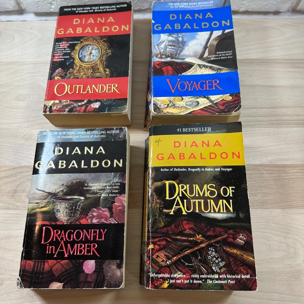 Set of 4 Outlander series books in early covers, by Diana Gabaldon